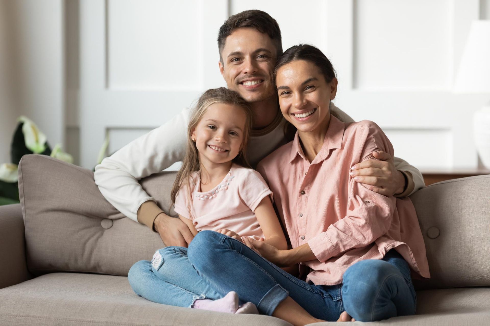 Couple and child sitting together